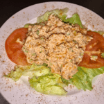 Fresh Prepared Seafood Salad On A Bed Of Lettuce & Tomato
